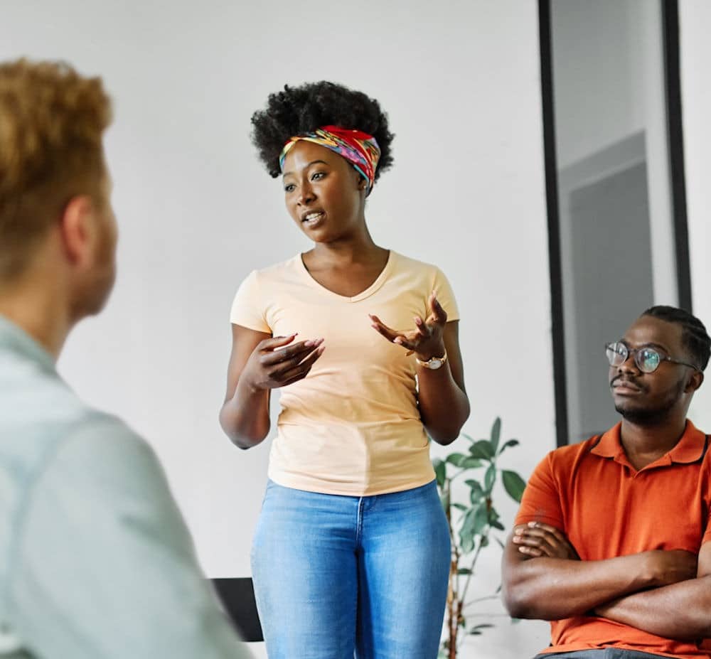 drug-related-aging woman in group therapy session for drug abuse